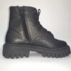 Borcegos Eco cuero negro con cierre y cordones detalle corazon suela tractor para niñas Pians
